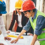 a team managing and communicating on a construction project drawings