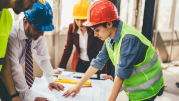 a team managing and communicating on a construction project drawings